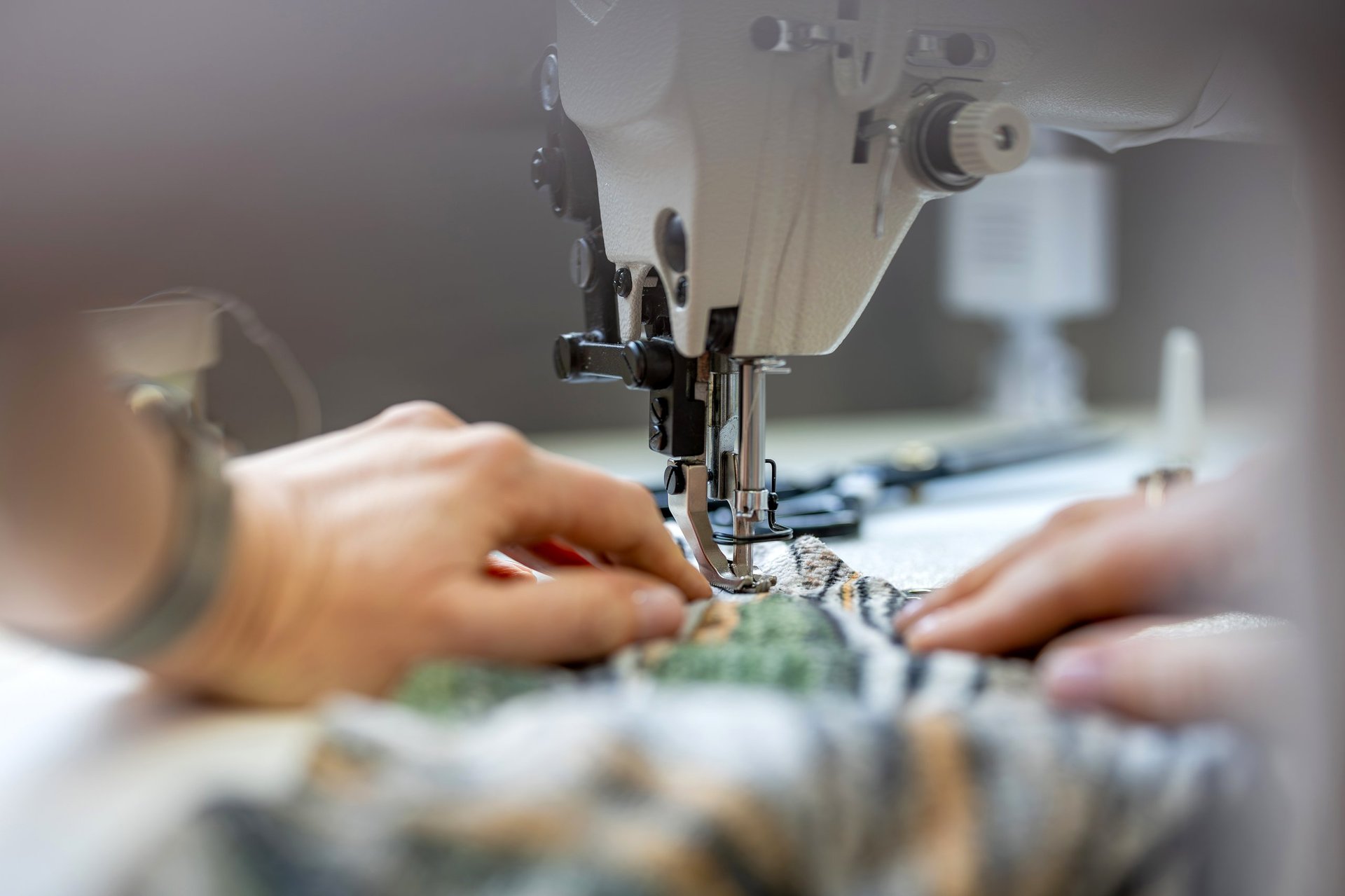 Close-Up of Sewing Process on Fabric Material